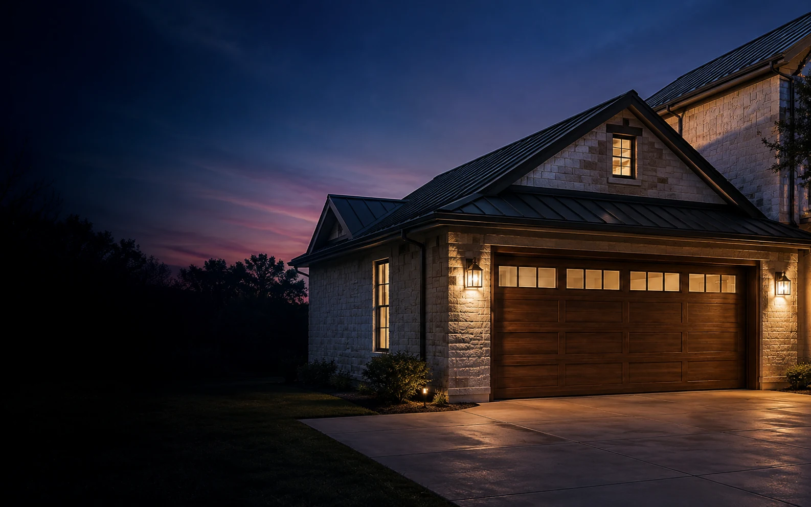 Texas home with a wooden garage door illuminated at dusk